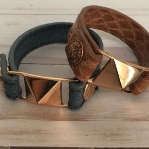 Pair of leather and rose gold bracelets.